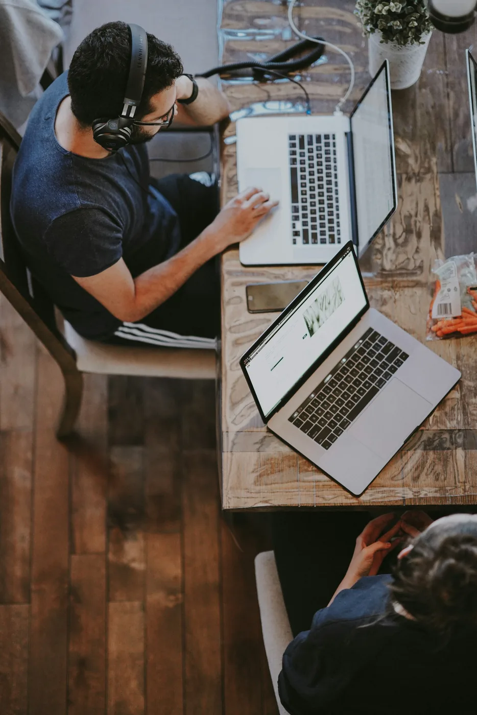 Student studying online with laptops — AcademItaly learning platform and progress tracking for Italian university exam preparation